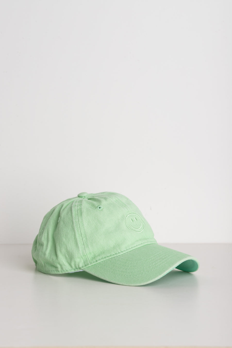 Grüne Cap